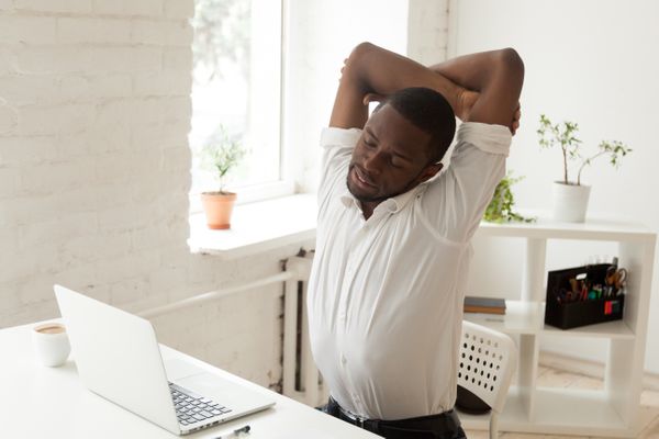 Six Tension-Relieving Poses For Desk Dwellers